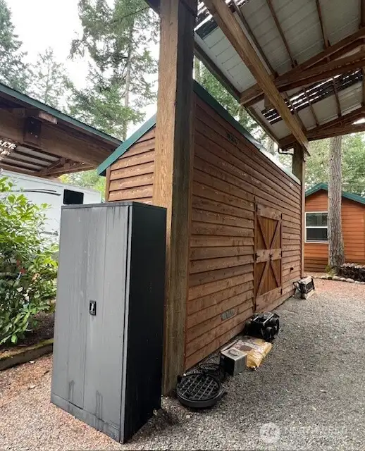 SHED WITH STORAGE AND ELECTRICITY