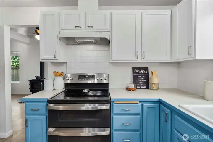 Contemporary kitchen offering ample cabinetry and storage solutions