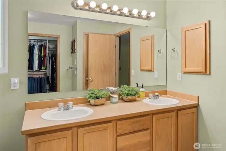 Spacious double vanity offering plenty of storage