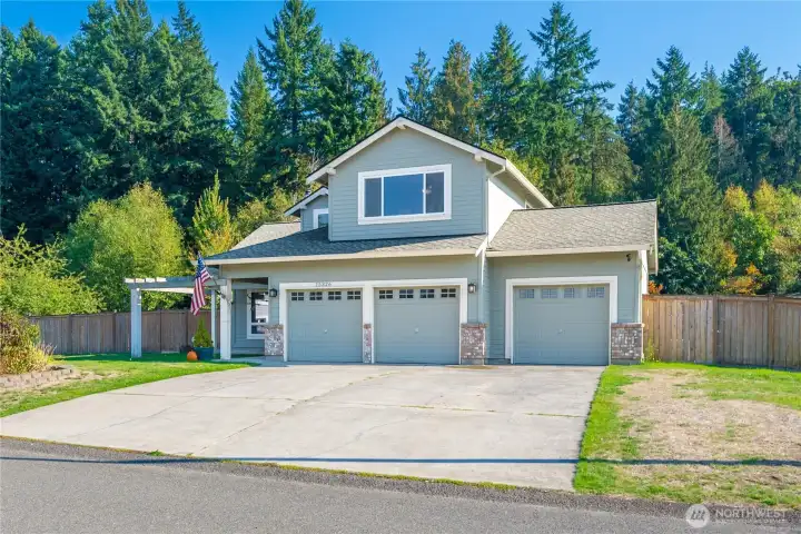 Generous driveway space for multiple vehicles