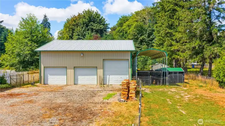 36x36 Shop with extra tall door for RV and an RV covered canopy