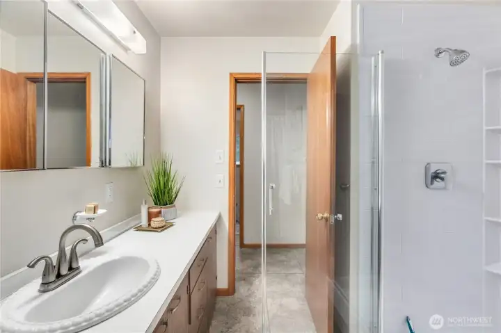 Main Bath and separate tub shower and walk in shower
