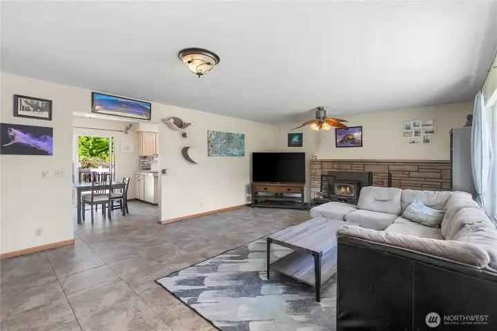 Large living room and cozy fireplace/wood stove