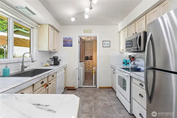 Kitchen with a new refer and dishwasher (not in this photo)
