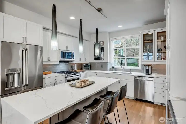 New lighting including upscale pendants lights in kitchen
