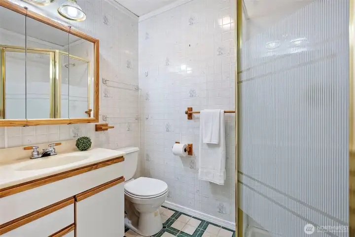 3/4 bath off of the den or primary.