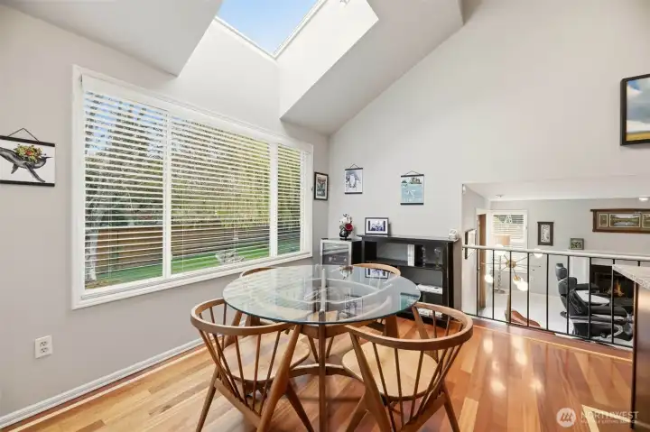 Kitchen with eating space that is open to lower level.