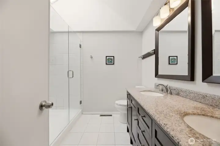 Upstairs Primary Bathroom. Tile shower recently re-grouted!