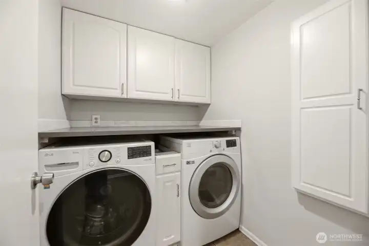 Lower level utility room with built-in storage
