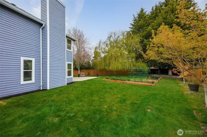 There is an outdoor storage shed that adds both convenience and functionality.