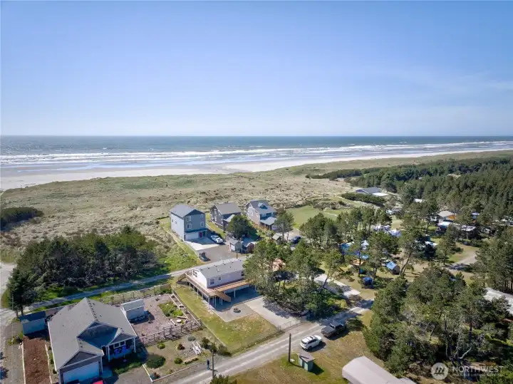 Great proximity to having your toes in the sand via the trail you can see in the far left center of this shot!