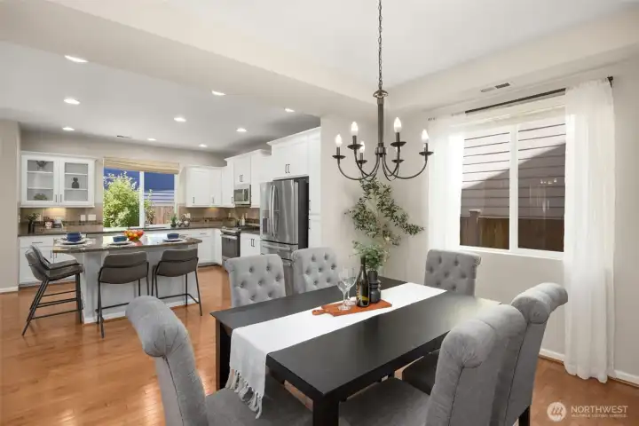 Soaring 9_ft ceilings and expansive windows provides natural light for the main floor