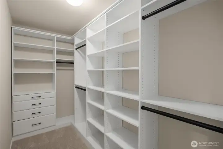 Wood_closet organizers with drawers in master bedroom