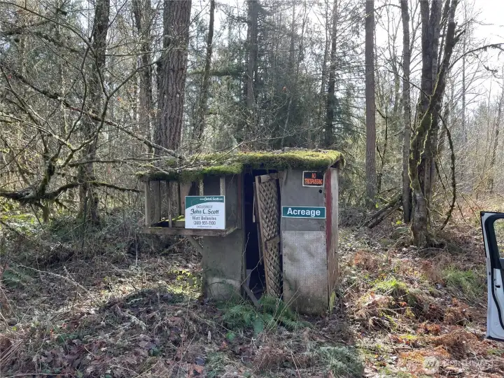 Looking at the Northwest corner of the property, the road turns left then goes on a slight incline the the level 3 acres which would be the building site.