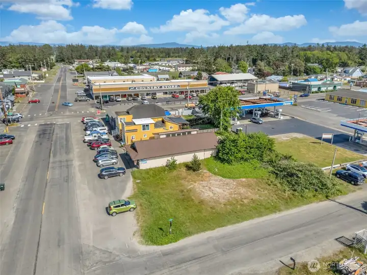 Corner-lot setting provides excellent exposure and flexibility for future site design and development.