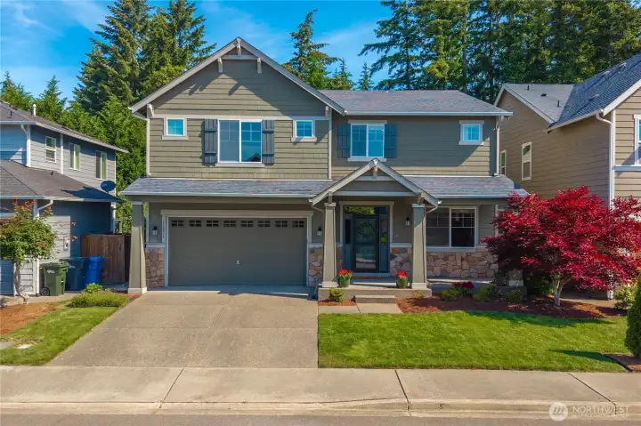 Welcome home to this spacious Gig Harbor North gem with over 3,200 square feet of living space