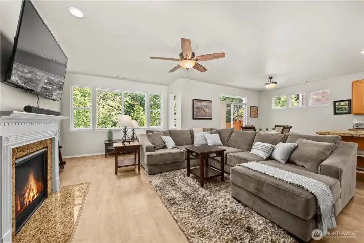 Expansive great room seamlessly connecting kitchen, dining, and family space