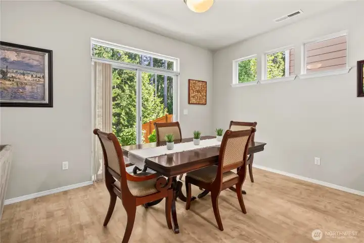 Dining room featuring a sliding door for seamless access to the backyard and indoor-outdoor living