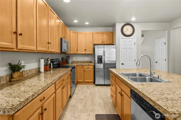 Kitchen featuring stainless steel appliances and a pantry for easy everyday living