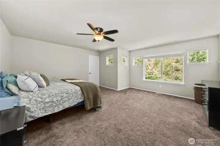 Upstairs primary suite serving as a true private retreat