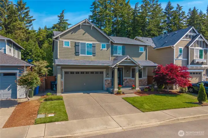 Well-maintained exterior with inviting curb appeal and simple, easy-care landscaping