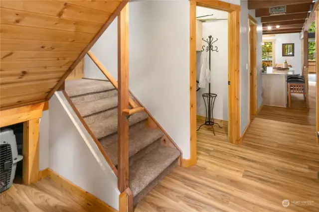 The stairwell near the entry leads to the Upper Level loft/bunkroom.