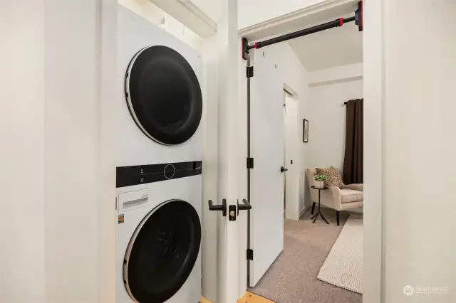 Newer updated stacking washer and dryer in the closet off of the bedroom.