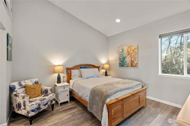 Bedroom in apartment with vaulted ceilings