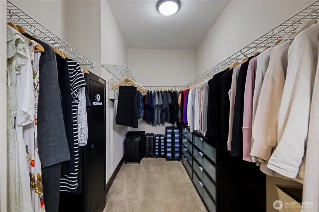 The massive walk-in closet provides plenty of space for wardrobe and storage.
