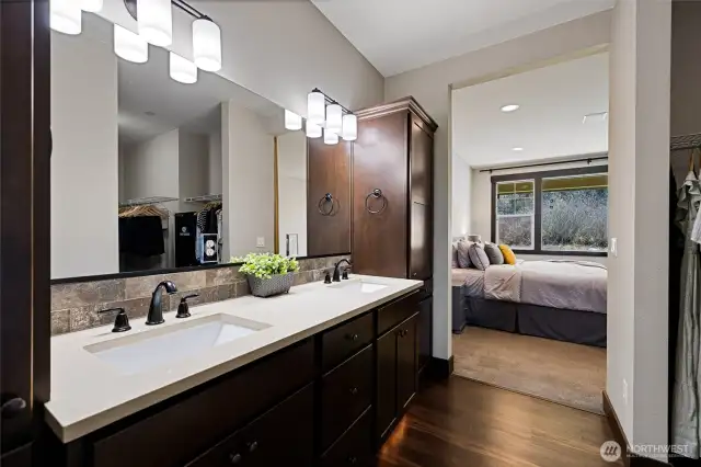 The en-suite primary bathroom feels like new, with beautiful finishes and modern details.
