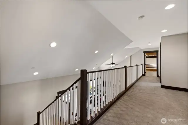 Upstairs hallway leads you to the ultimate entertainment zone—the theatre room.