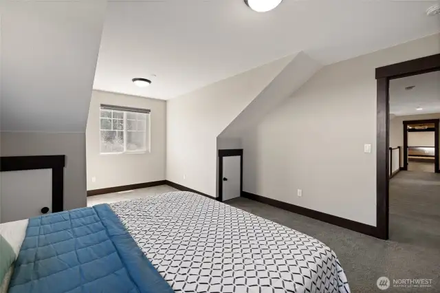 This bedroom also includes an extra storage area, perfect for toys or seasonal items.