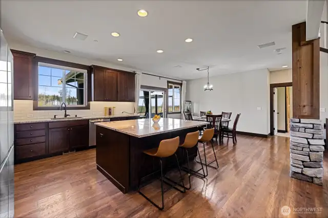 Beautiful cabinetry, sleek countertops, and ample storage make the kitchen both functional and stylish.