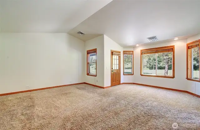Primary Bedroom with access to the patio and hot tub