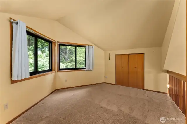 Finished space with closet overlooking great room.