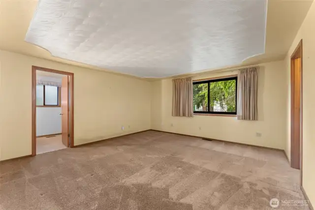 Primary suite with entrance to primary bath on left.