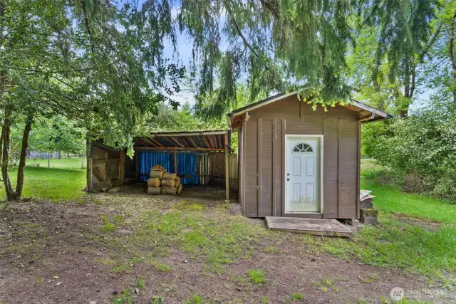 Small storage and wood shed on the way back to the house from the barn.