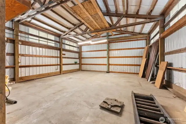 Convenient rolling door near the drive at the far end of the shop.