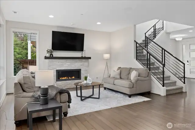 Seamless blend of comfort and style with stone surround fireplace