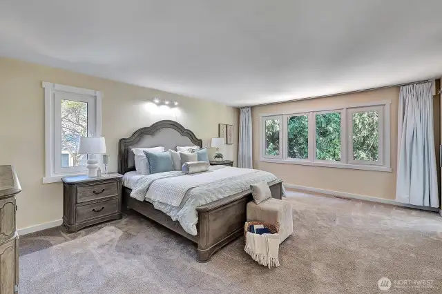 Primary bedroom is located on the upper floor and features Smart window curtains