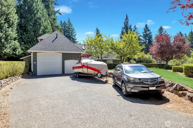 Addition has a garage with RV door & car lift