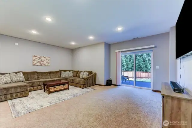 Very large bonus room on the lower level.  Easy access to the backyard.  Possible MIL unit? Buyer to verify!