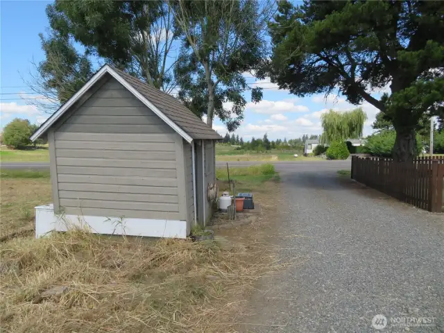 Small outbuiliding to the immediate right of the driveway as you enter.