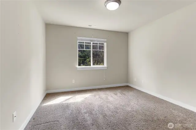 Bedroom two has a large window overlooking the front yard and the neighborhood park which is located directly across the street.