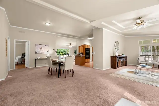 Step inside and be welcomed by a bright, open floor plan designed for both comfort and entertaining. Expansive living and dining areas flow seamlessly together, highlighted by tray ceilings and abundant natural light.