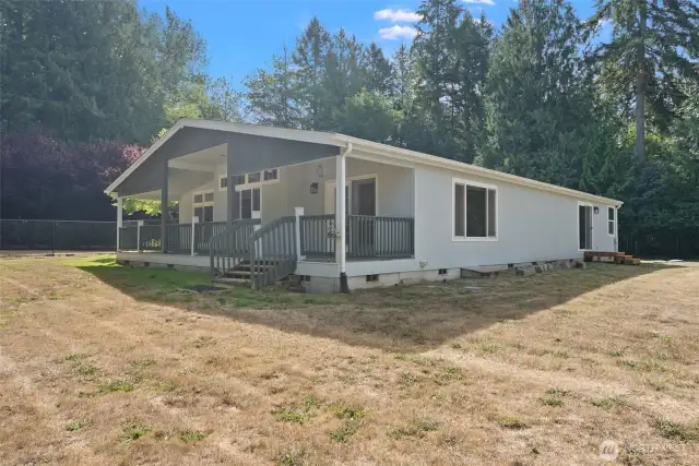 Enjoy the charm of a welcoming covered front porch, perfect for morning coffee or relaxing evenings.