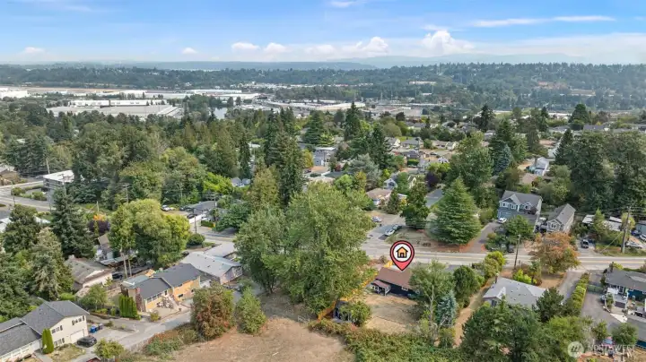 From this angle, you can see how the home backs to open land while remaining just minutes from grocery stores, schools, and quick freeway access.