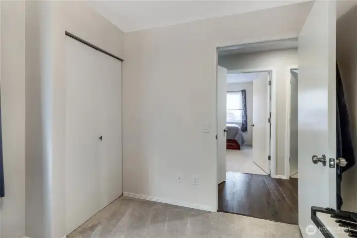 Looking out of the third bedroom into the hall.