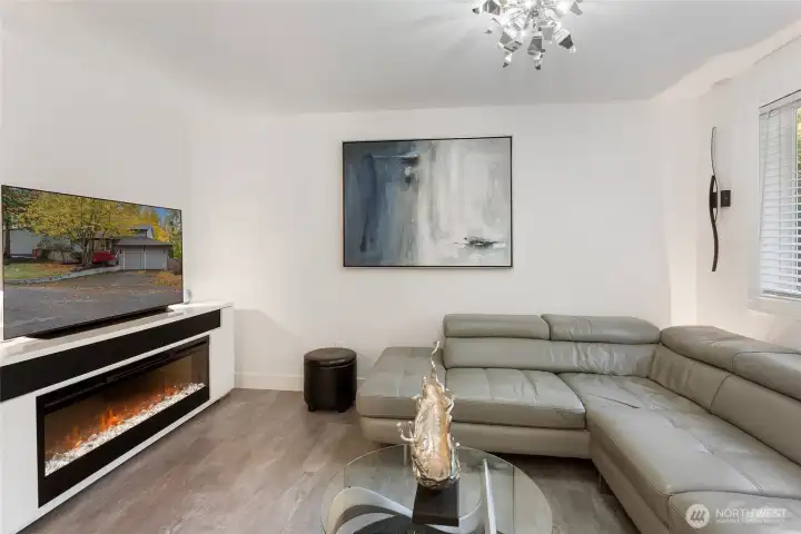 2nd Living Room adjacent kitchen.  Furnishings can remain if buyer chooses