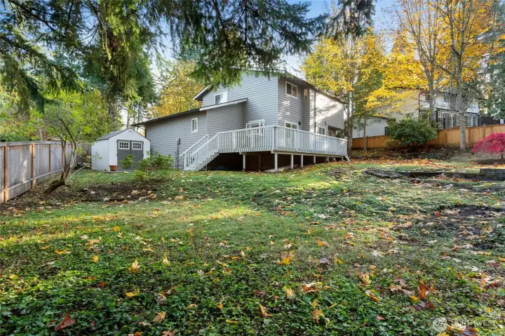 View from corner of lot showcasing this large backyard